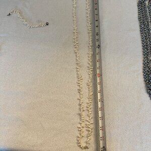 Very long pearl necklace and bracelet